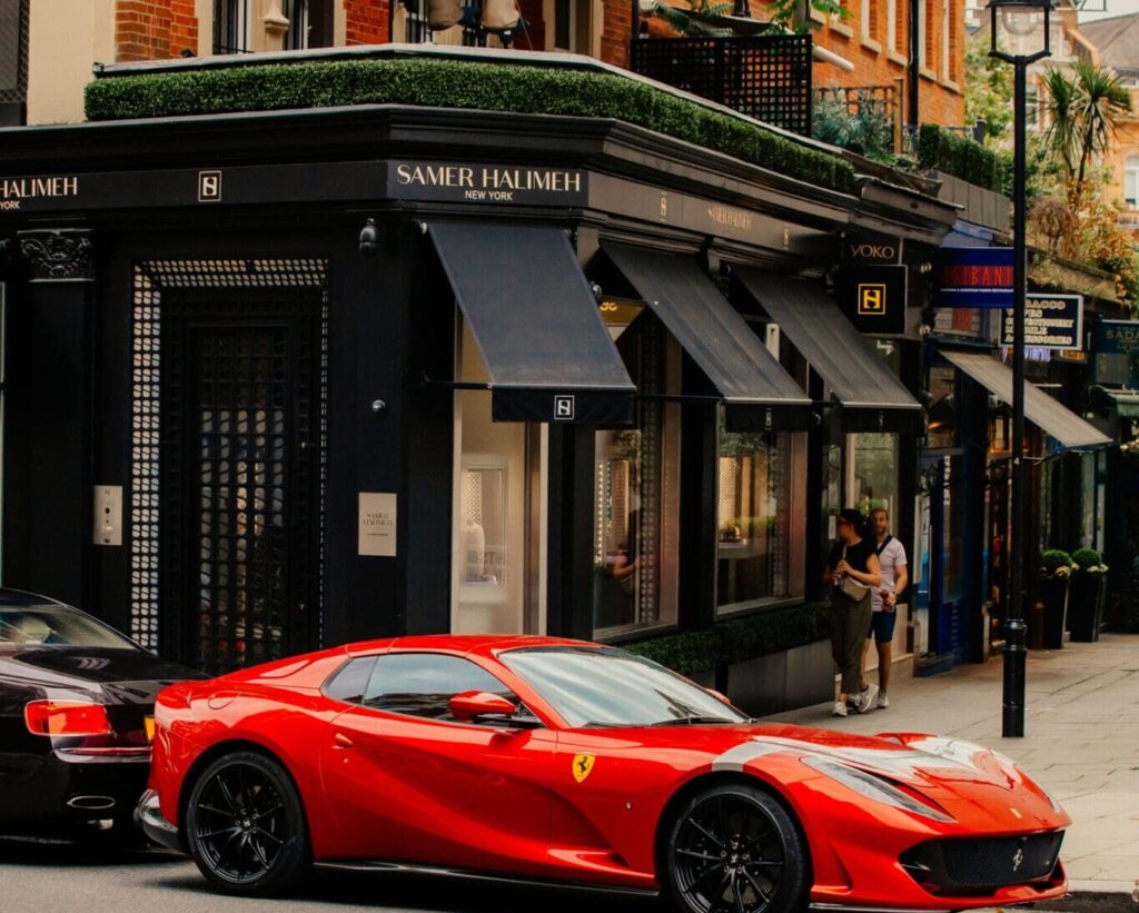 A red Ferrari parked outside Diamond Dealer Samer Halimeh, Knightsbridge